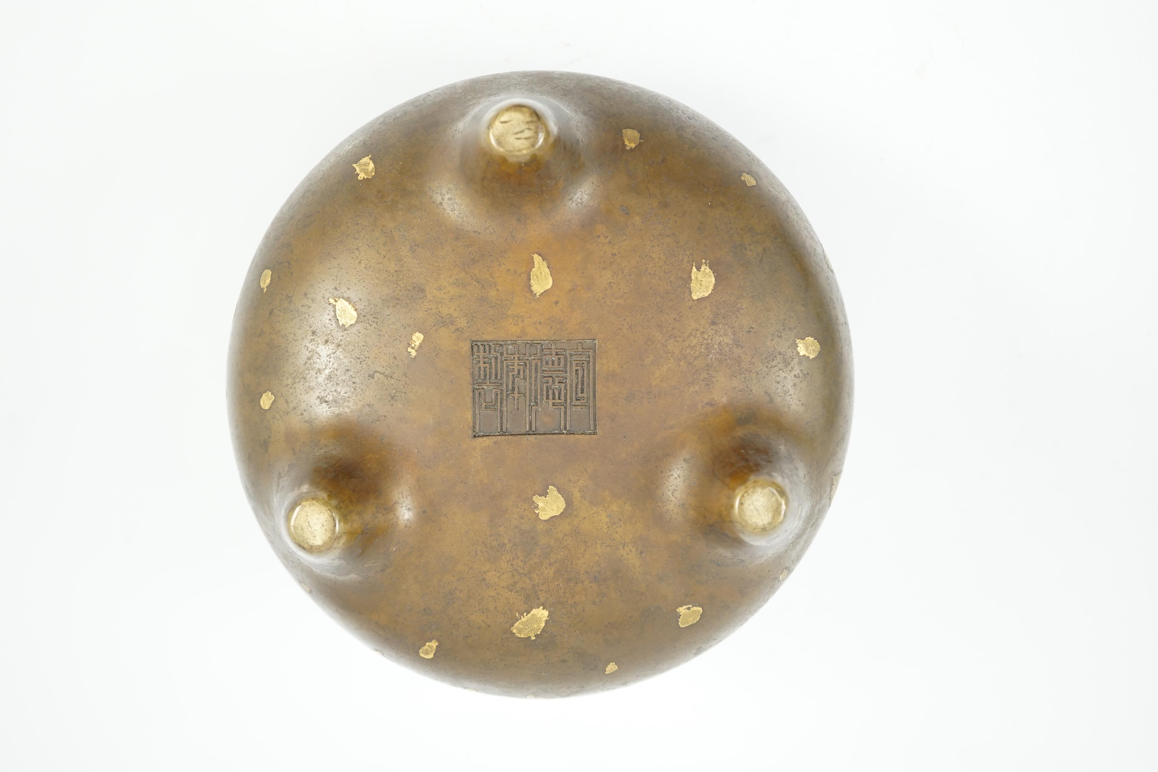 A large Chinese gold-splashed bronze tripod censer, ding, Kangxi period